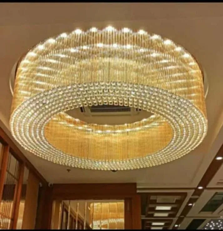 Premium circular crystal jhumar chandelier installed in a luxury hotel lobby, ideal for dealers, distributors, and bulk lighting projects