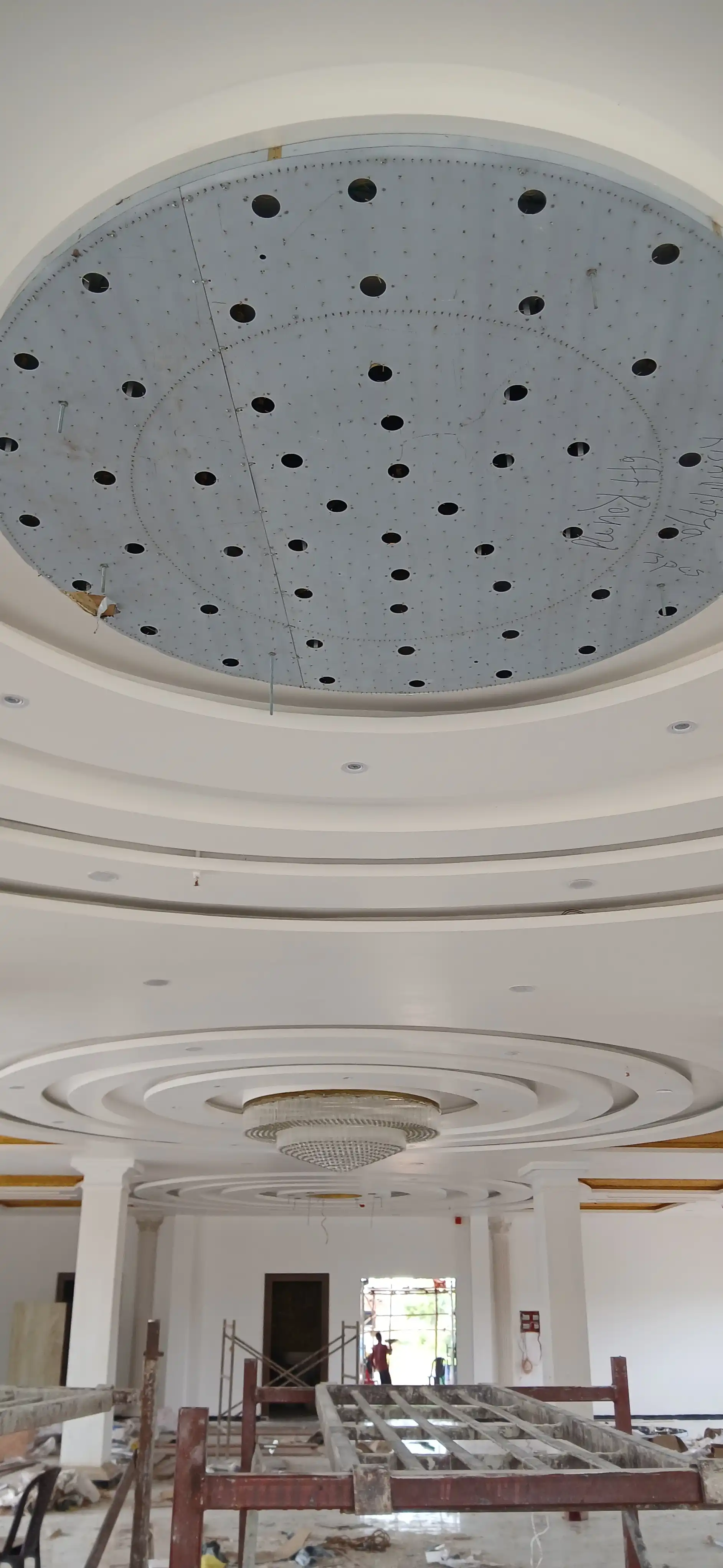 SS sheet ceiling base prepared for custom chandelier installation
