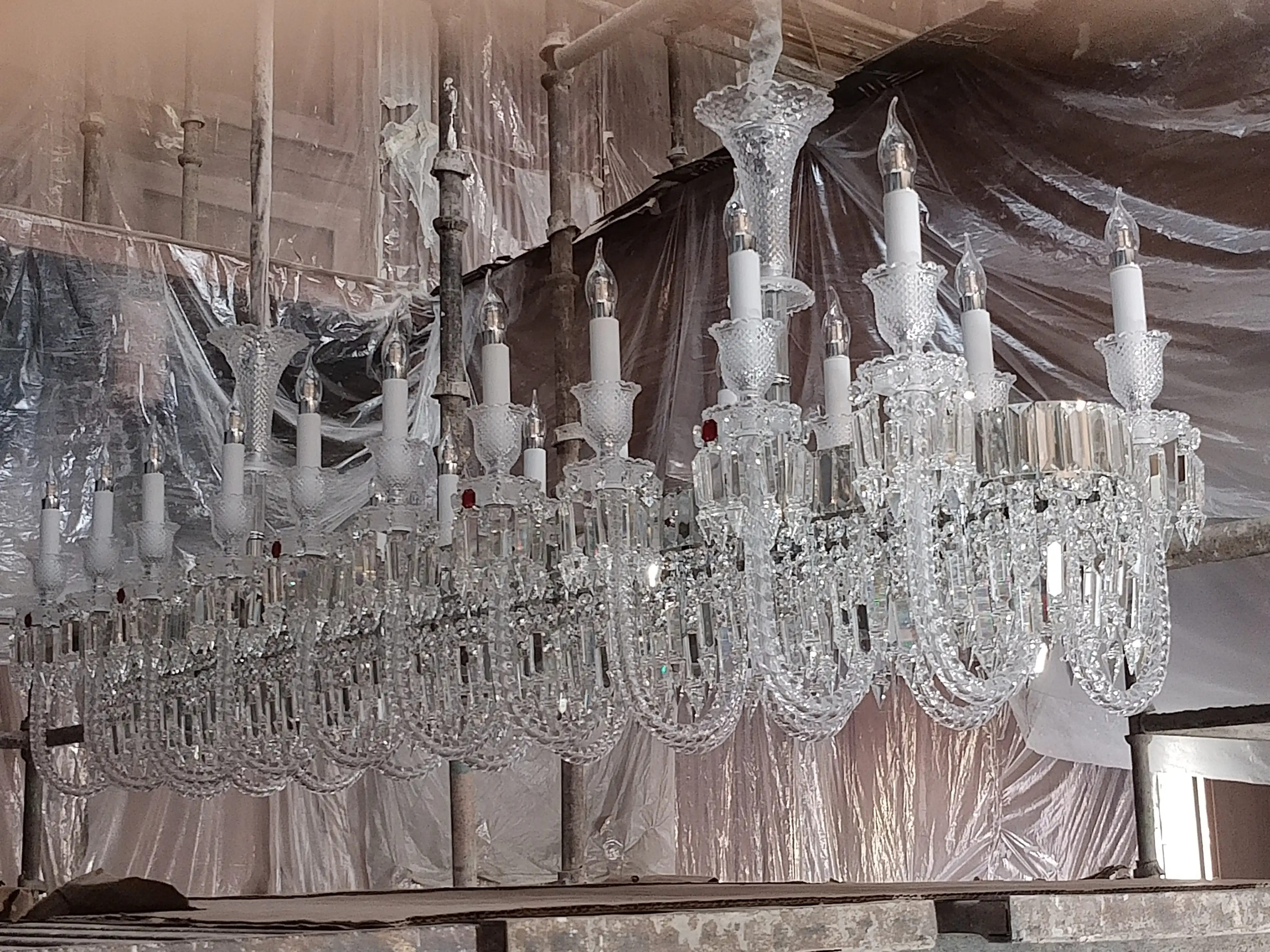 China imported linear crystal chandelier with multiple candle-style lights and crystal drops